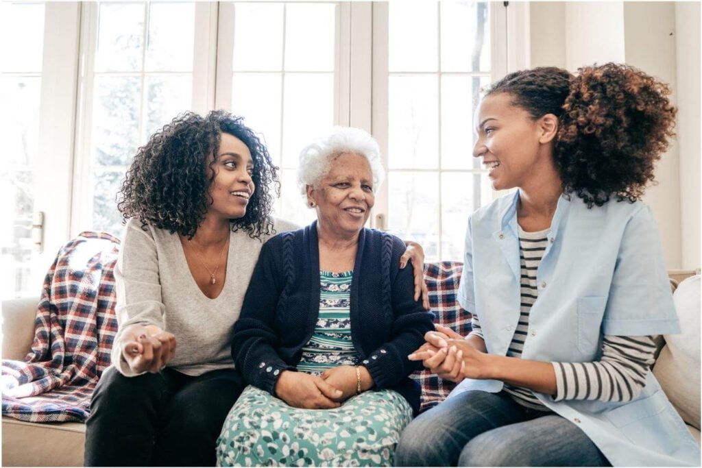 daughter talking to elderly mom about transitioning to senior living