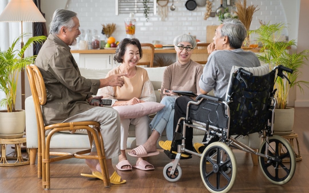 family visiting senior at senior care facility